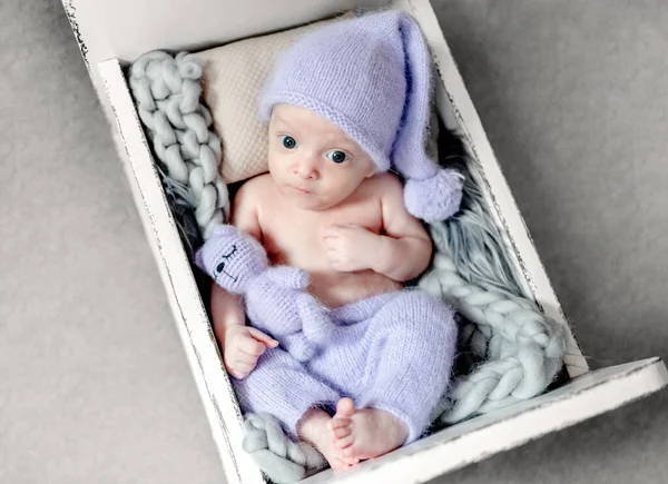 Newborn Baby Wearing Knitted Costume Hat Holding Soft Kitty Cat — Stockfoto