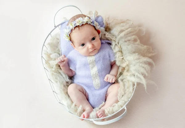 Newborn Baby Girl Wearing Knitted Costume Wreath Lying Fur Cute — Stockfoto