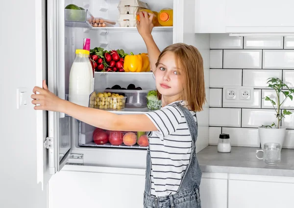 Preteen Girl Opens Refrigerator Vegetables Fruits Kitchen Female Child Kid — Foto Stock