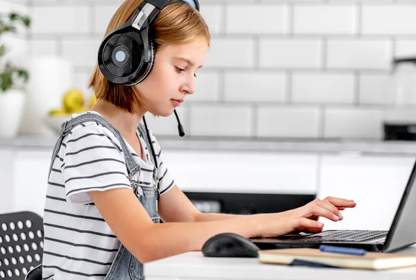 Preteen Girl Studying Wearing Headphones Online Learning Lesson Laptop Child — Foto de Stock