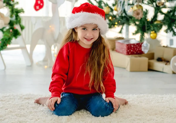 Child Girl Christmas Time Sitting Carpet Room Decorated Tree Background — Stock Photo, Image
