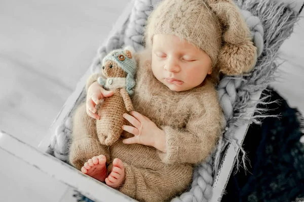 Newborn Baby Boy Sleeping Fur Tiny Bed Holding Hands Cheeks — Stock Photo, Image