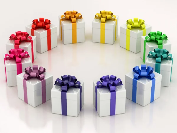 White gift boxes with varicolored ribbon — Stock Photo, Image