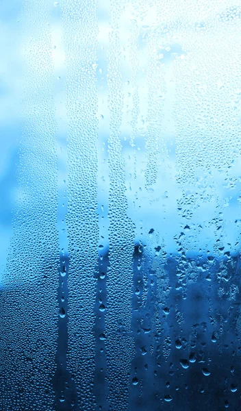 Gotas de agua natural sobre vidrio — Foto de Stock