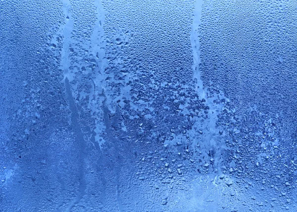 Frozen water drops on glass — Stock Photo, Image