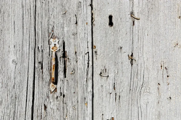 Zeer oude houten deur met handvat — Stockfoto