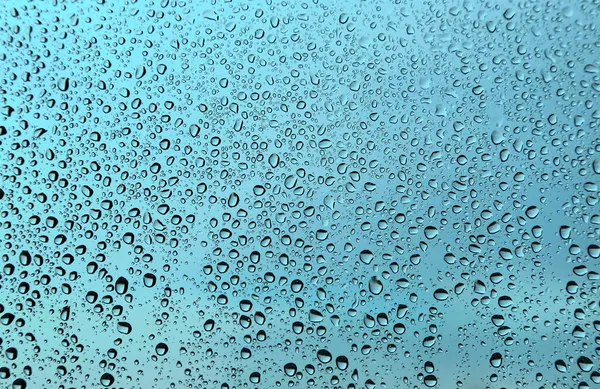 Gotas Agua Sobre Vidrio Primer Plano Textura Azul Verde Natural —  Fotos de Stock