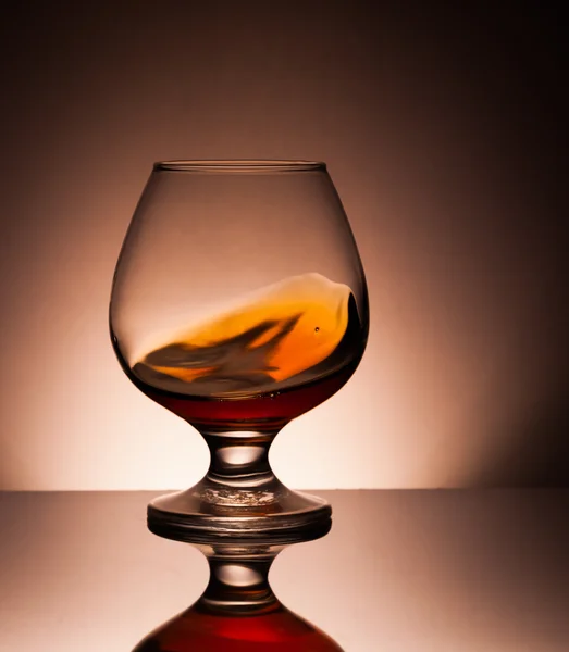 Glass with cognac — Stock Photo, Image