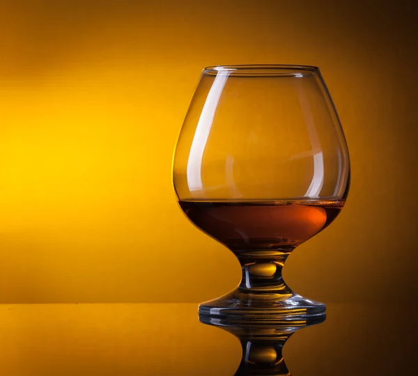 Glass with cognac — Stock Photo, Image