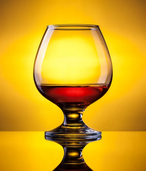 Glass with cognac — Stock Photo, Image