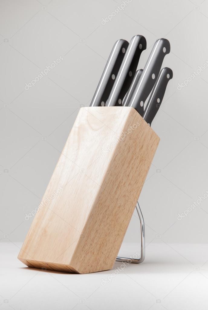 Set of knives in wooden support