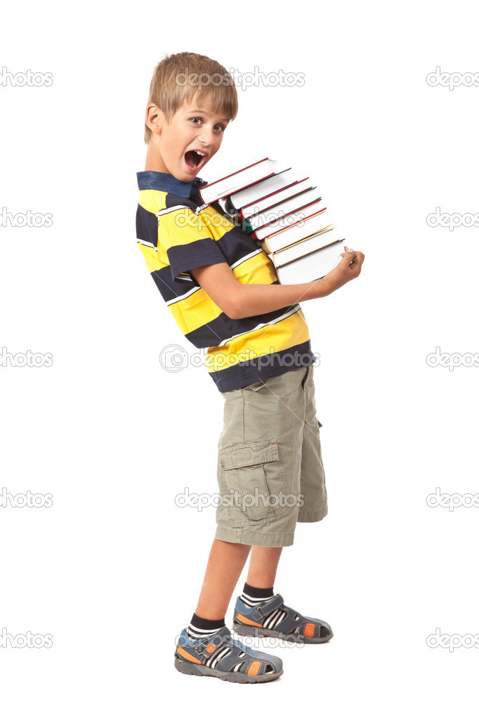 School boy is holding books. Back to school