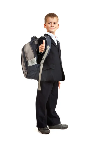 Schoolboy sitting on books. Back to school Stock Picture