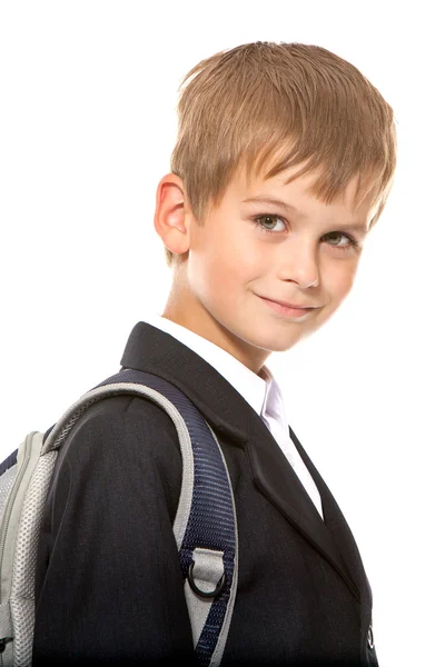 Schooljongen zittend op boeken. terug naar school — Stockfoto