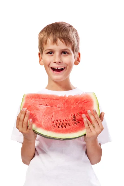 Chłopiec jest jedzenie arbuza — Zdjęcie stockowe