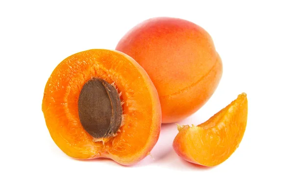 Two ripe apricot sectioned by knife — Stock Photo, Image