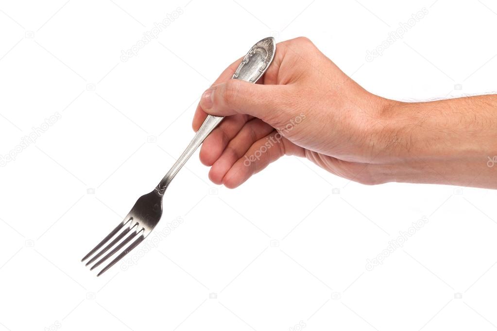 Right mans hand with empty metallic fork