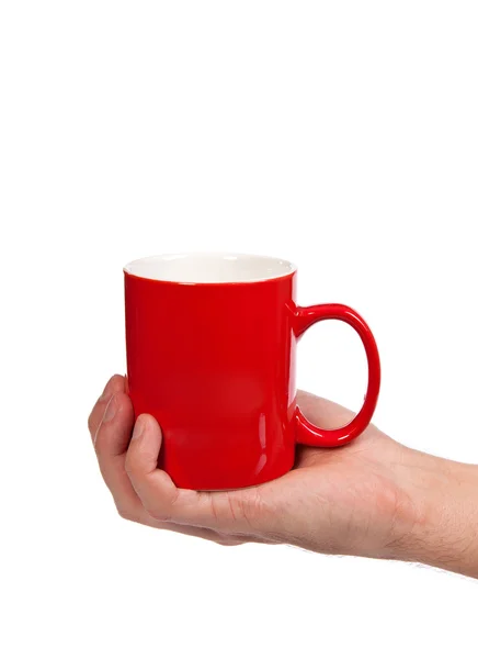 Main masculine tient une tasse rouge — Photo