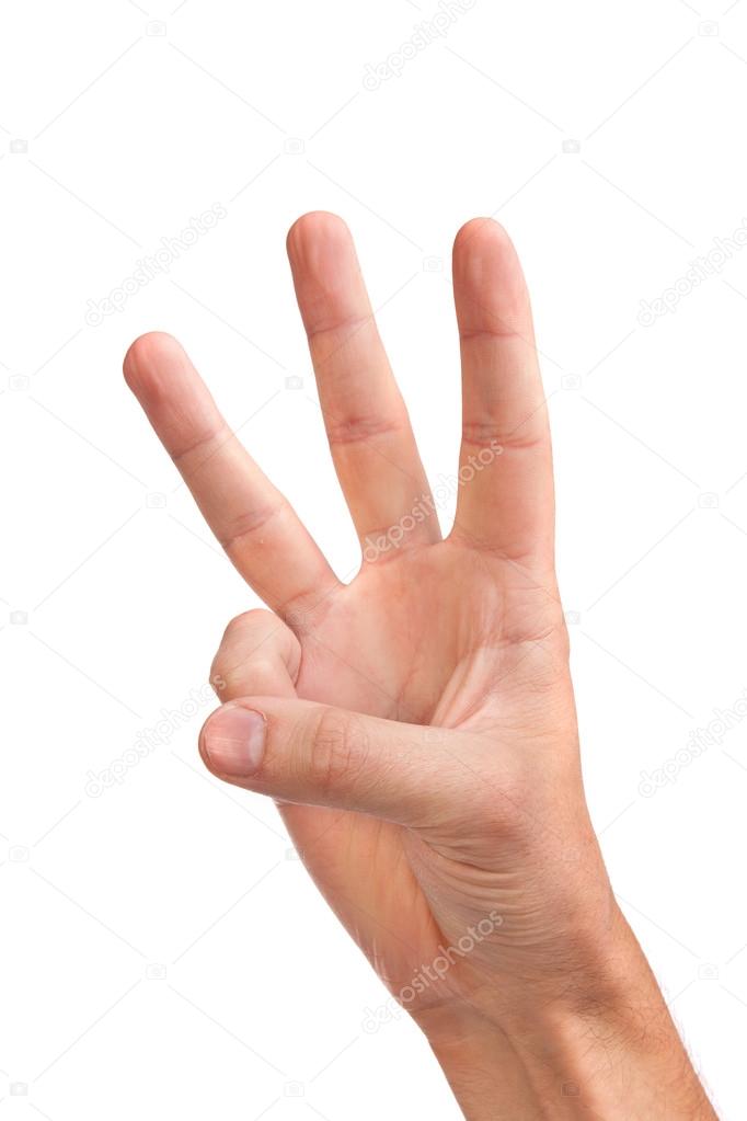 Three fingers being held in the air by a male hand