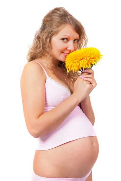 Zwangere vrouw is streelde haar buik — Stockfoto