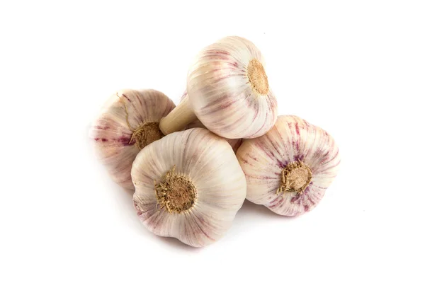 Group of garlics . A heads of garlics isolated — Stock Photo, Image