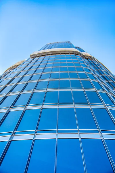 Modern blue glass wall of skyscraper — Stock Photo, Image