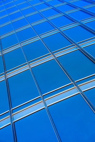 Modern blue glass wall of skyscraper — Stock Photo, Image