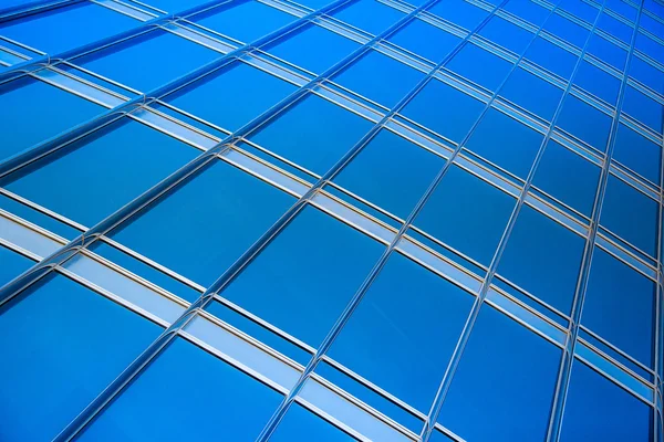 Modern blue glass wall of skyscraper — Stock Photo, Image