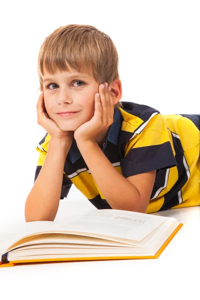 Školy chlapec drží knihu — Stock fotografie
