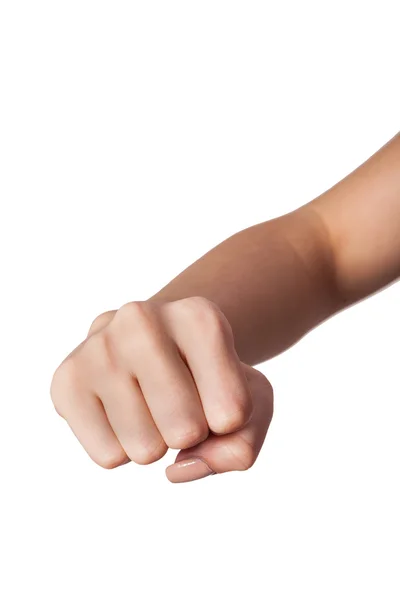Vrouwelijke hand met een gebalde vuist geïsoleerd — Stockfoto