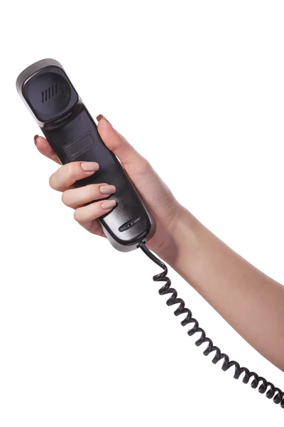 Hand holding an old black telephone tube — Stock Photo, Image