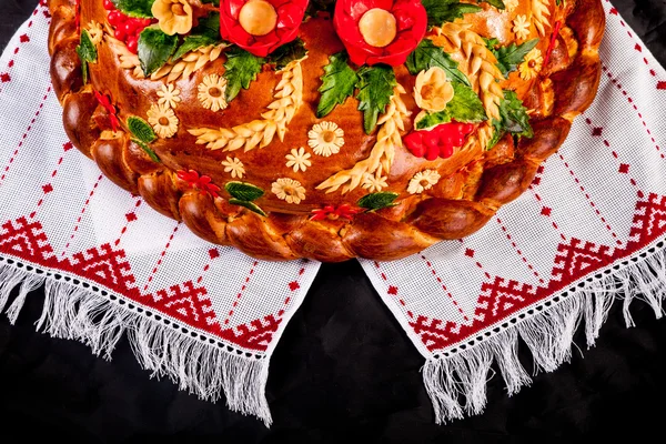 Ukrainian festive bakery Holiday Bread on black — Stock Photo, Image