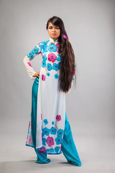 Beautiful asian woman wears a national dress — Stock Photo, Image