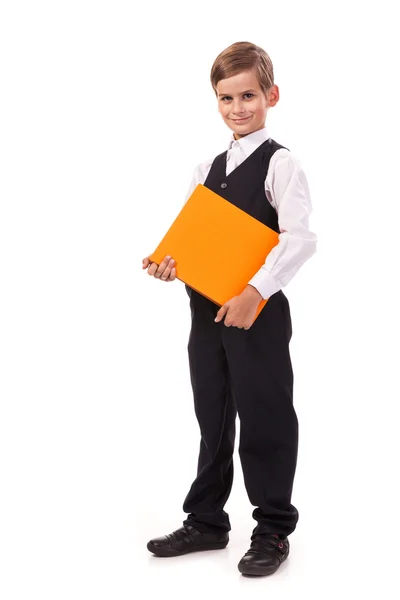 School boy is holding a book — Stock Photo, Image