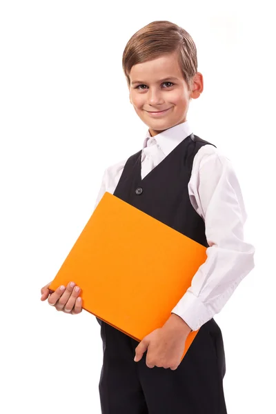 Il ragazzo della scuola sta tenendo un libro — Foto Stock