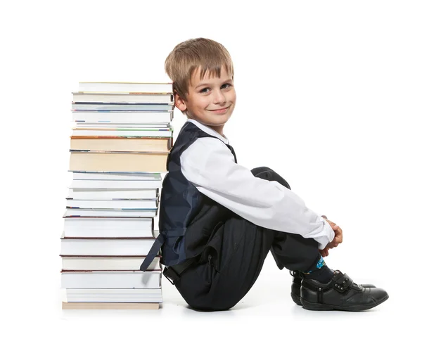 Jongen en boeken — Stockfoto