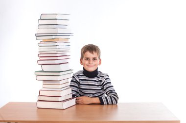 öğrenci ve bir yığın kitap