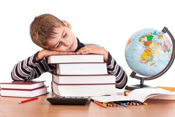 Cute schoolboy is writting — Stock Photo, Image