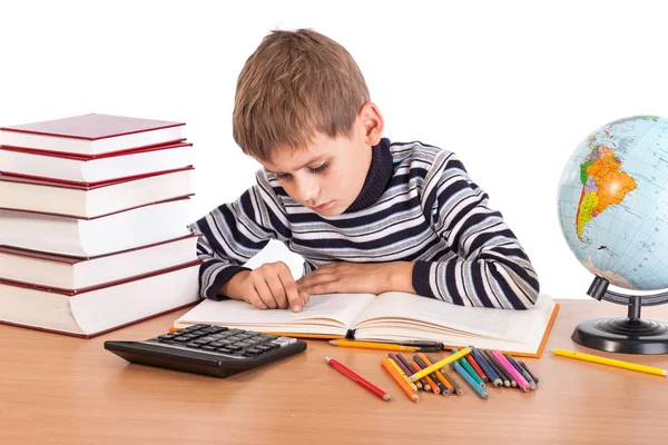 Is het schrijven van schattige schooljongen — Stockfoto