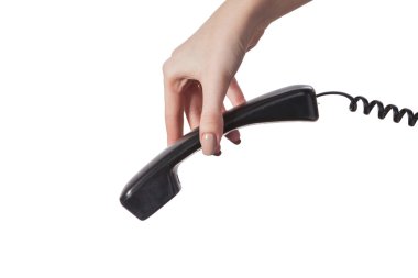 eski bir siyah telefon tüpü tutan el