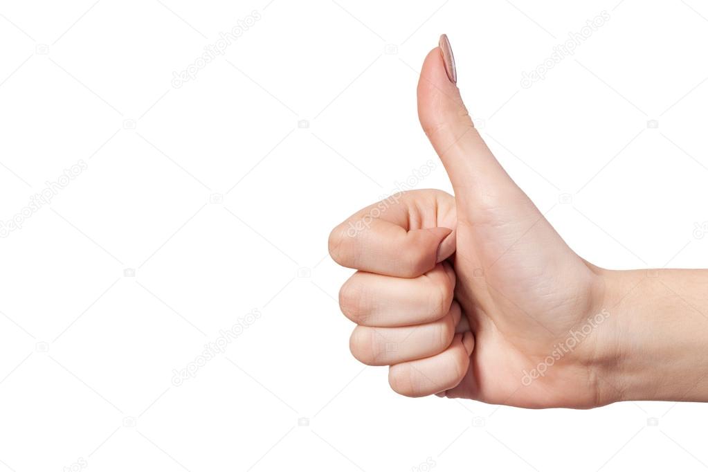 Female hand showing thumbs up sign isolated on white