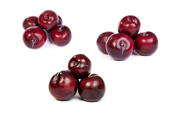 Set of Group of plums on white — Stock Photo, Image