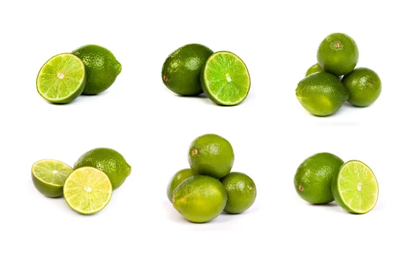Set of whole limes and half limes isolated on a white — Stock Photo, Image