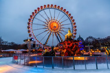 Christmas wheel at Alexanderplatz in Berlin clipart