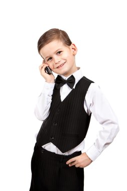 bir cep telefonu tutan çocuk