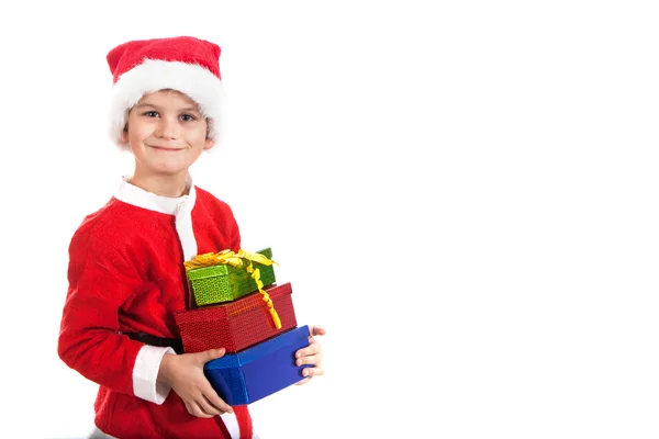 Santa is holding a christmas gift — Stock Photo, Image