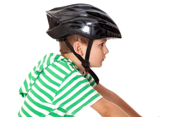 Kask ile çocuk bisikletçi — Stok fotoğraf