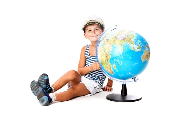 Jongen houden een globe — Stockfoto