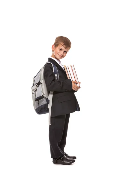 Niño sosteniendo libros — Foto de Stock