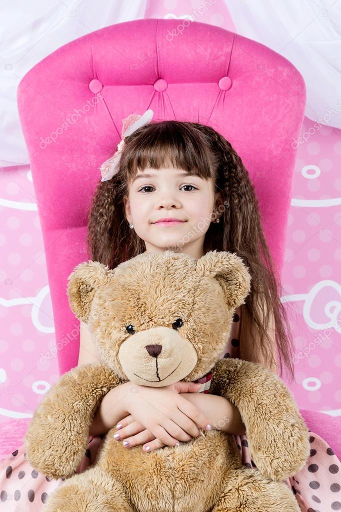 Girl Hugging Teddy Bear